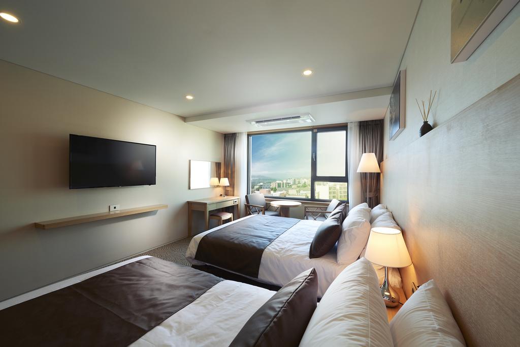 Benikea Jungmun Hotel Seogwipo Quarto foto